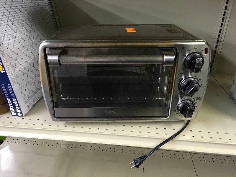 lot 573 image: Oster Convection Countertop Oven, Retail $49.99