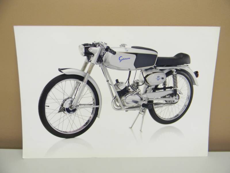 lot 34 image: VINTAGE MV AGUSTA 50CC GERMANO SPORT 2A SERIE MOTORCYCLE AD PRINT WITH OFFICIAL STAMPSEAL - NICE CONDITION - APPROX 19 BY 13 - SEE PICTURES