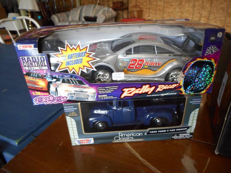 lot 15 image: Collectible Toys (still in the boxes)
