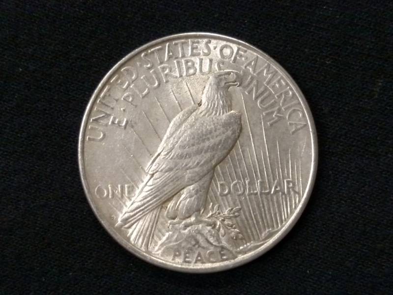 1922 D AU Peace Silver Dollar...