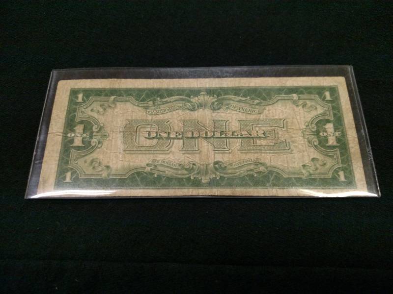 1928 A Funny Back One Dollar Silver...
