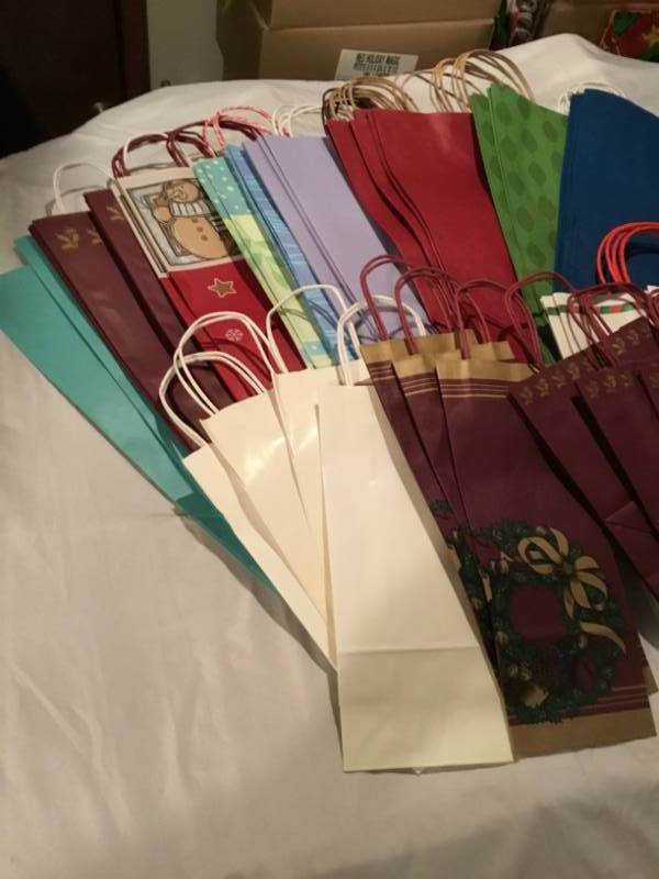 Lot of 50 gift bags - variety of different kinds and sizes.