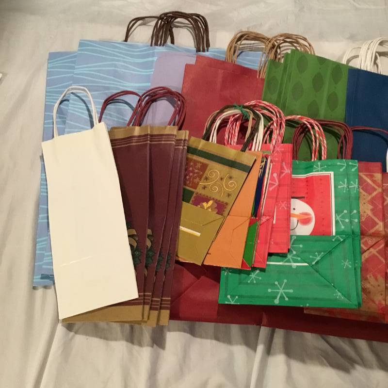 Lot of 50 gift bags - variety of different kinds and sizes.