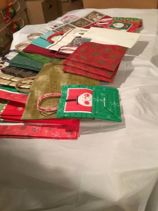 Lot of 50 gift bags - variety of different kinds and sizes.