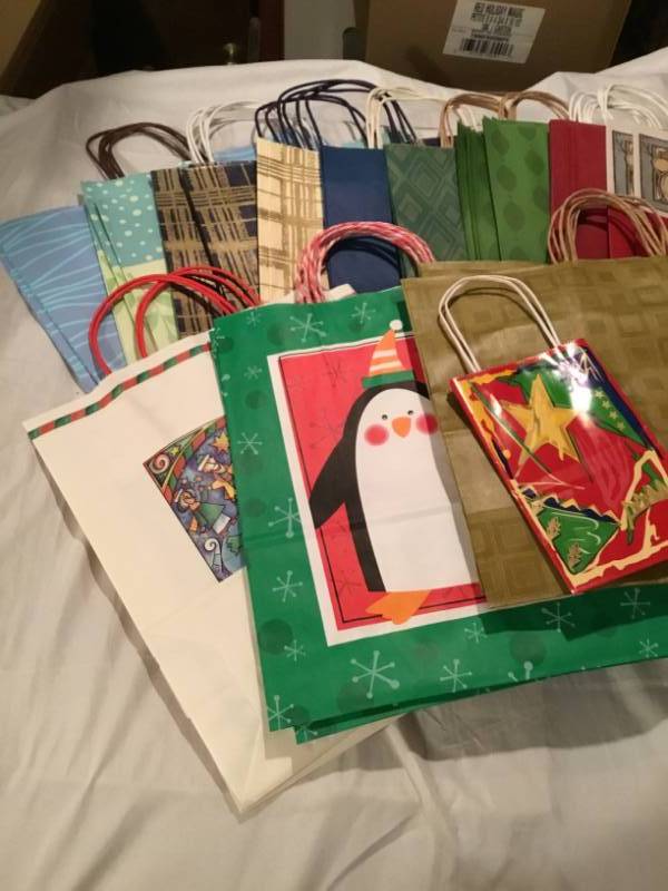 Lot of 50 gift bags - variety of different kinds and sizes.