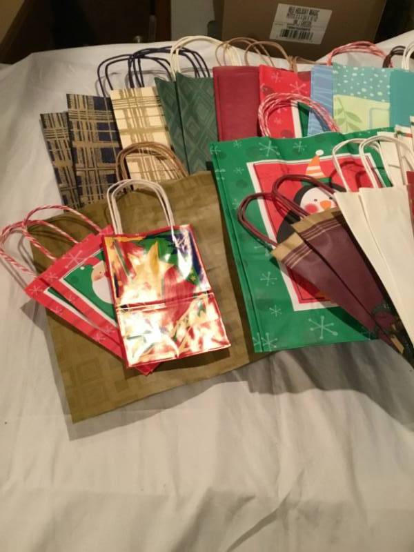 Lot of 50 gift bags - variety of different kinds and sizes.