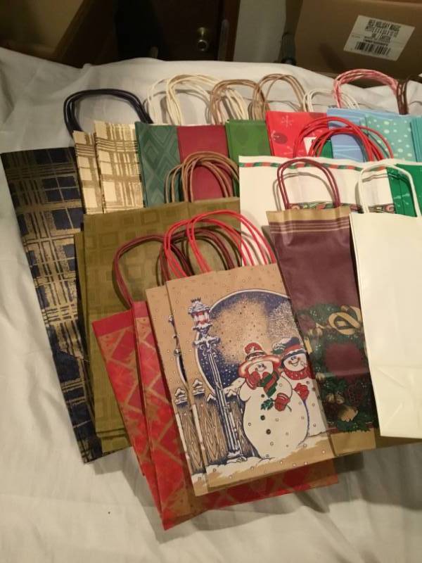 Lot of 50 gift bags - variety of different kinds and sizes.