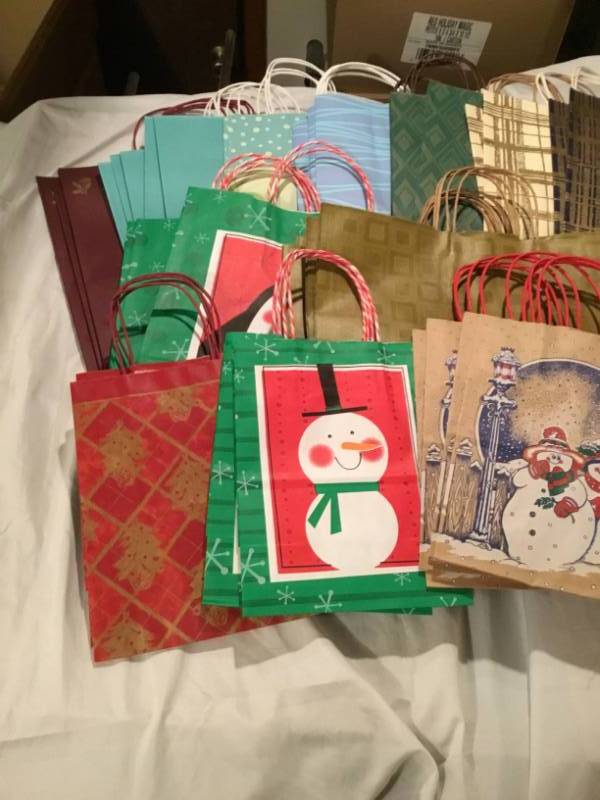 Lot of 50 gift bags - variety of different kinds and sizes.