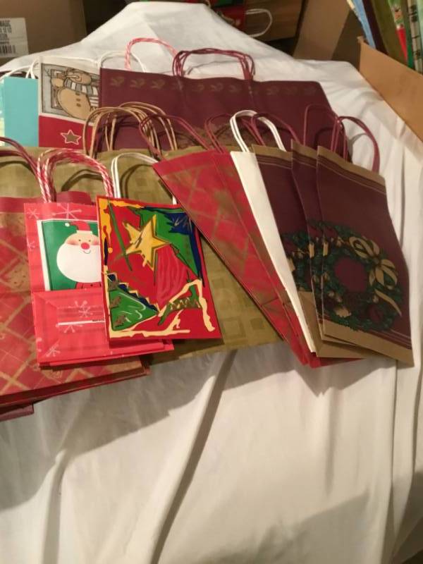 Lot of 50 gift bags - variety of different kinds and sizes.