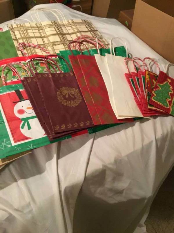 Lot of 50 gift bags - variety of different kinds and sizes.