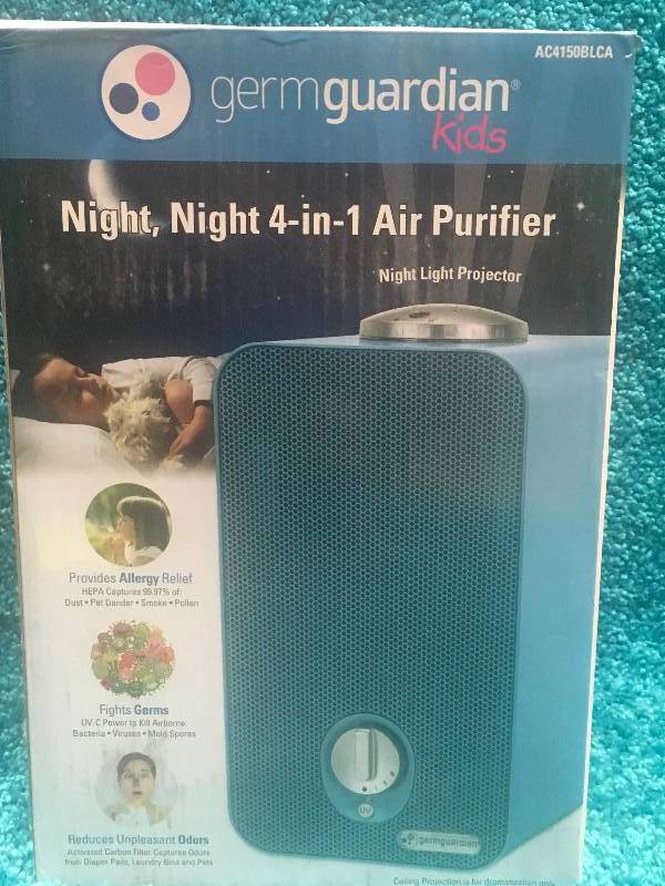 lot 1 image: GermGuardian 4-in-1 Night-Night HEPA Air Purifier System with Projector and 11 in. Table Top Tower in good working condition