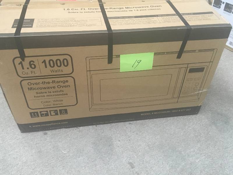 lot 19 image: Magic Chef 1.6 cu. ft. Over the Range Microwave in White in like new condition