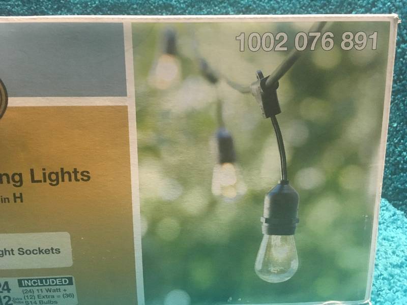lot 23 image: Hampton Bay 48 ft. 24-Socket Incandescent String Light Set