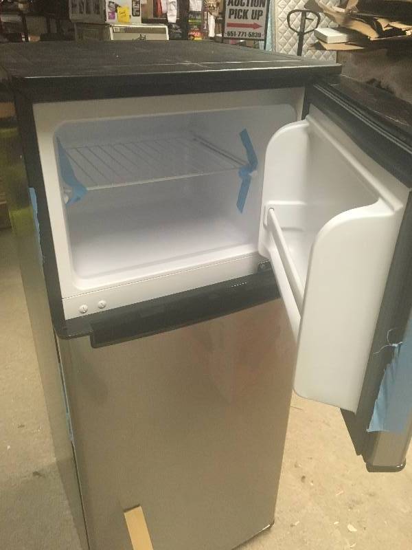 lot 30 image: Magic Chef 4.5 cu. ft. Double Door Mini Refrigerator in Stainless Look SEE PHOTOS SMALL CRACK