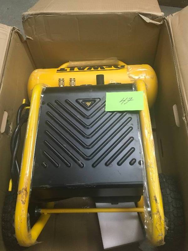 lot 47 image: DEWALT 4.5 Gal. Portable Electric Air Compressor in good working condition