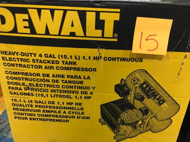 lot 15 image: DEWALT 4 Gal. Portable Electric Air Compressor in like new condition
