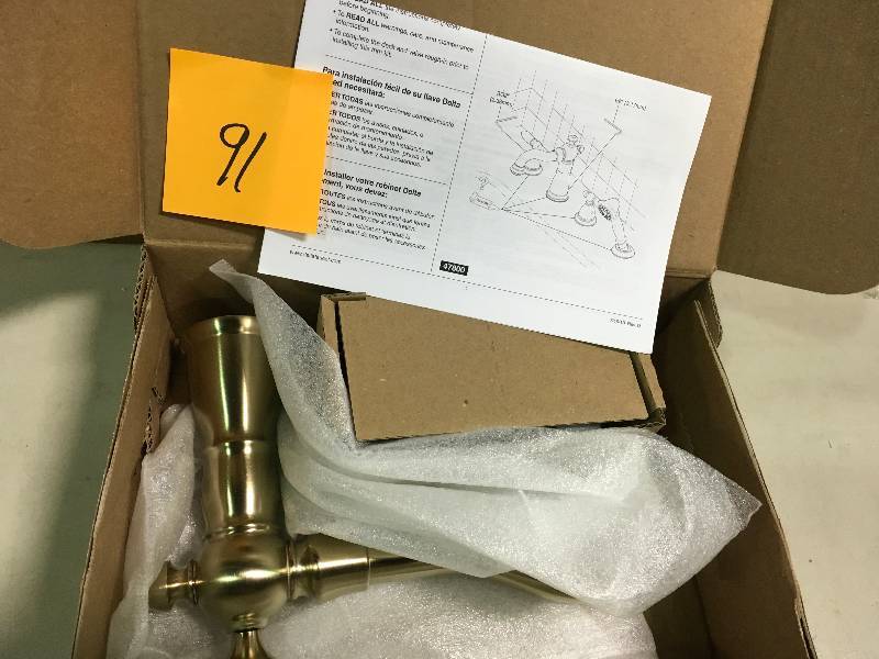 lot 91 image: Delta Victorian 2-Handle Deck Mount Roman Tub Faucet Trim Kit in Champagne Bronze (Valve and Handles Not Included) not used