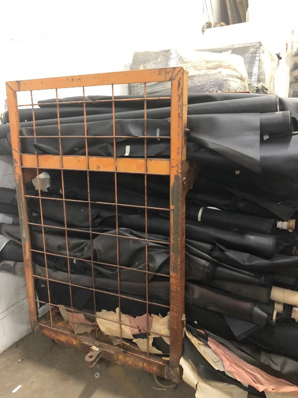 lot 101 image: Assorted Rolls of Various Nylon Fabrics suitable for making Backpacks, tents, BoatCar covers, etc indooroutdoor use mostly black - Cart NOT included