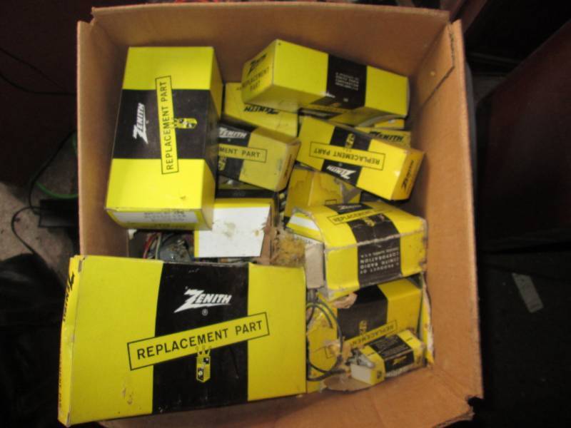 lot 89 image: Box of radio replacement parts, see...