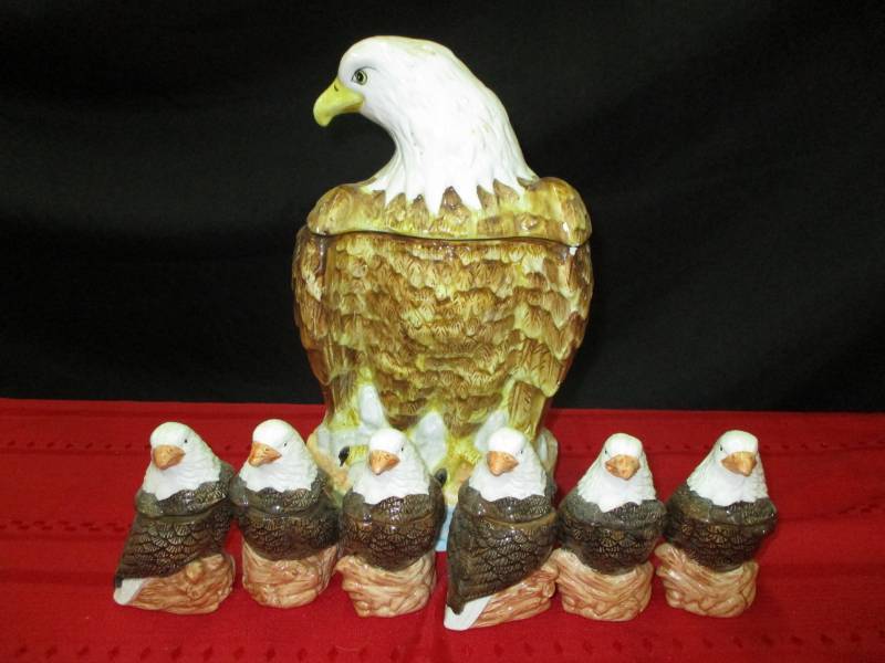lot 9 image: Ceramic eagle decorations and containers