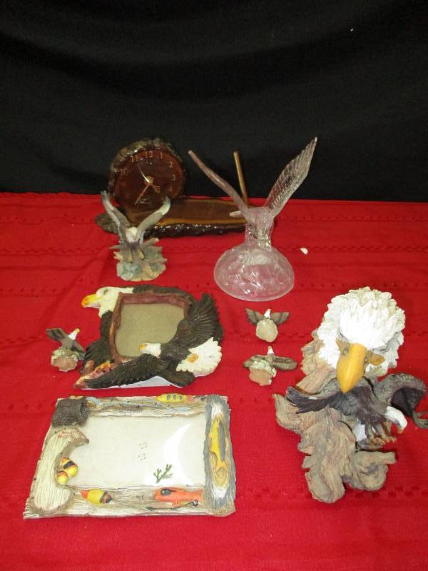 lot 13 image: Eagle dcor and sculptures, pen holder with clock