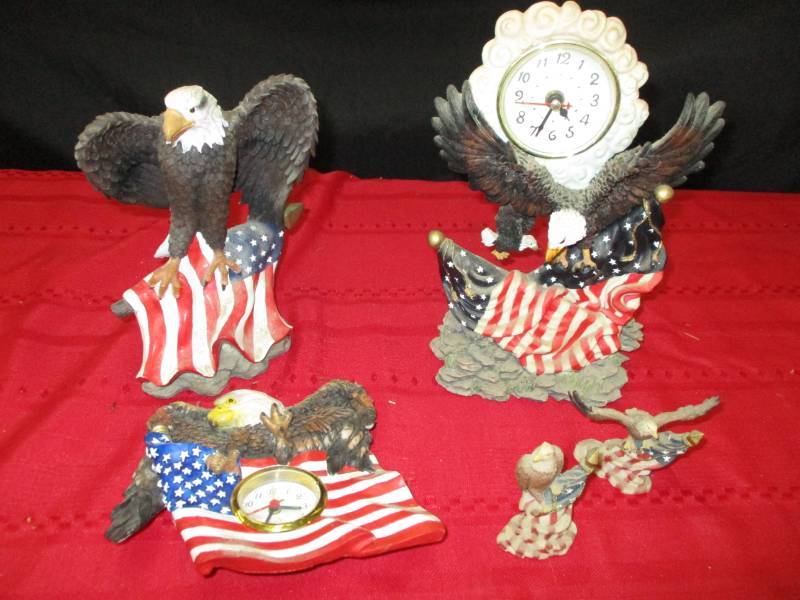 lot 14 image: Eagle sculptures, dcor with clocks