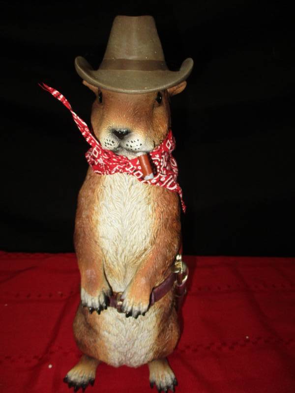 lot 16 image: Resin Groundhog with old western bandit outfit