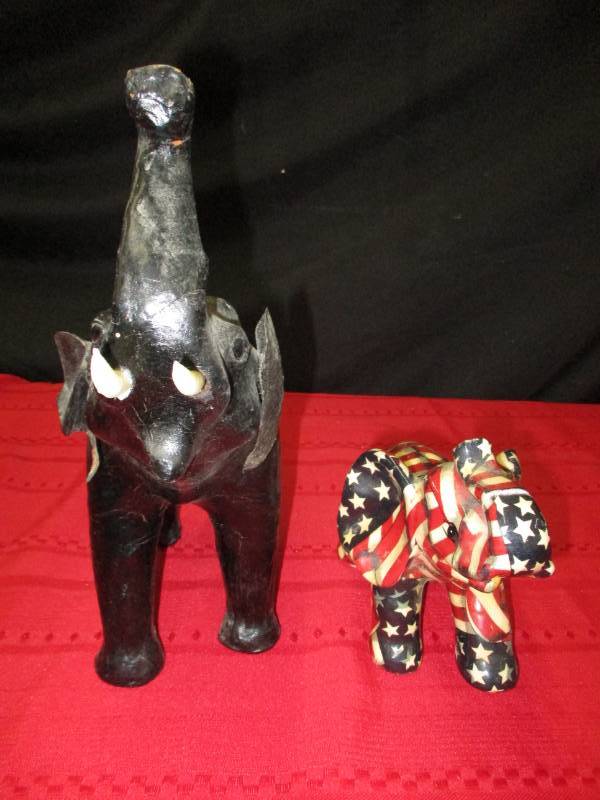 lot 17 image: Two elephant models, ceramic and plastic