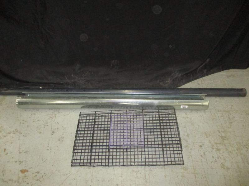 lot 44 image: two stove pipes, small thin metal fencing, ceiling jacksupport