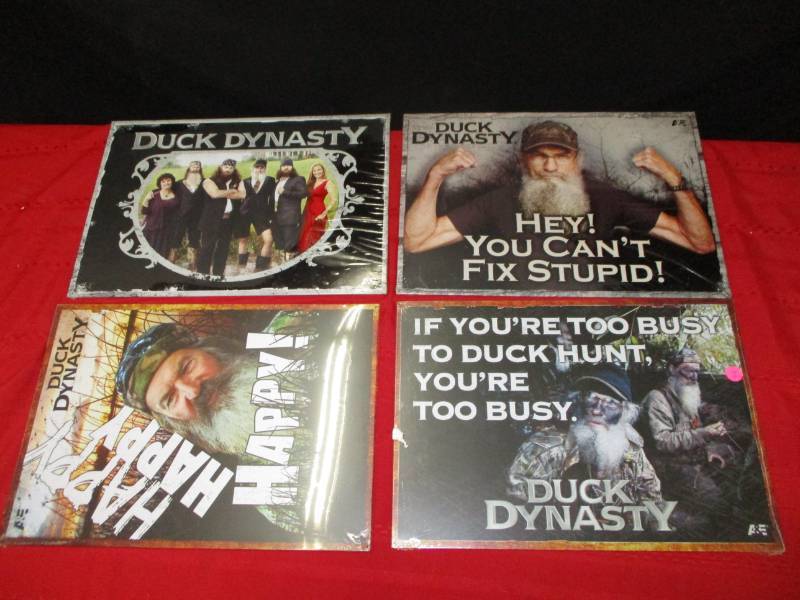 lot 74 image: 4 metal Duck Dynasty tv show decorations