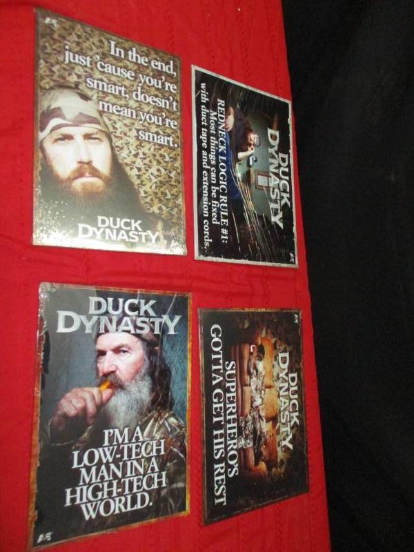 lot 76 image: 4 metal Duck Dynasty tv show decorations