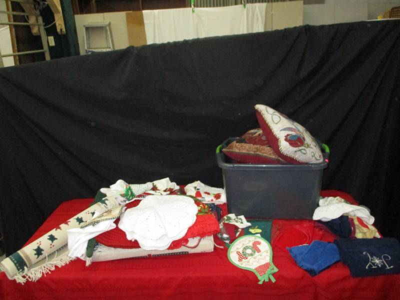 lot 80 image: Assortments of festively decorated pillows, rugs, dish towels