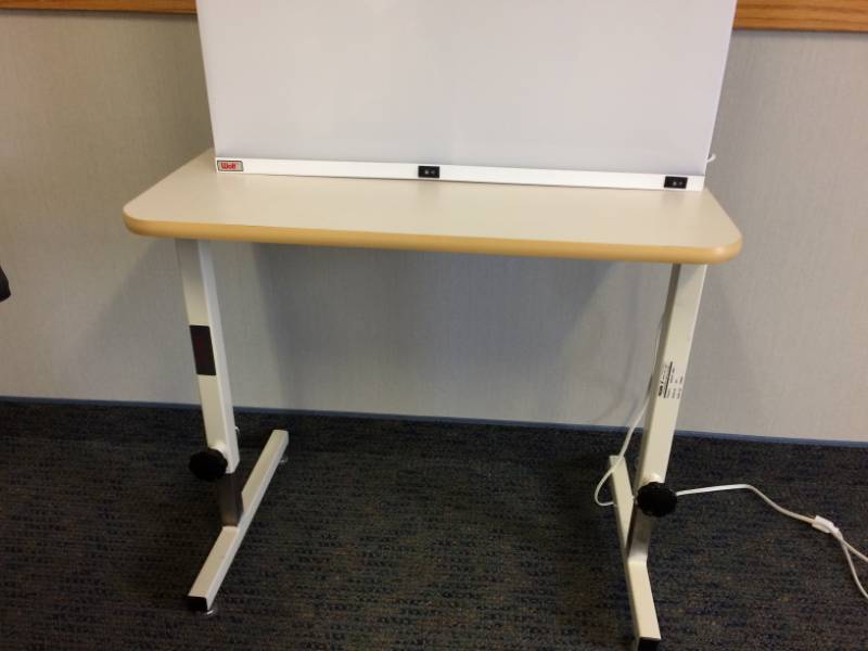 lot 8 image: MSRP $900 MIDLAND ERGONOMIC HEIGHT ADJUSTABLE HILO HAND THERAPY TABLE MODEL 5357