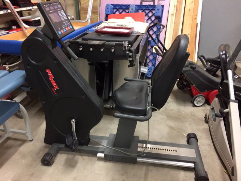 lot 48 image: MSRP $2800 PHYSICAL THERAPY COMMERCIAL FITNEX 5000R RECUMBENT BIKE - GREAT WORKING CONDITION