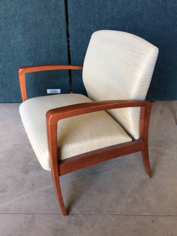 lot 53 image: MSRP $800 KRUG JORDAN GUEST CHAIR UPHOLSTERED OPEN ARM NATURAL CHERRY FINISH ON BEECH