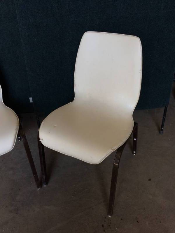 lot 72 image: 2 UPHOLSTERED BENT PLYWOOD BOTTOM ARMLESS CHAIRS UPHOSTERY IS FRAYING AND LOOKS LIKE IT IS NOT THE ORIGINAL - LOOKS A LITTLE MID CENTURY MODERN