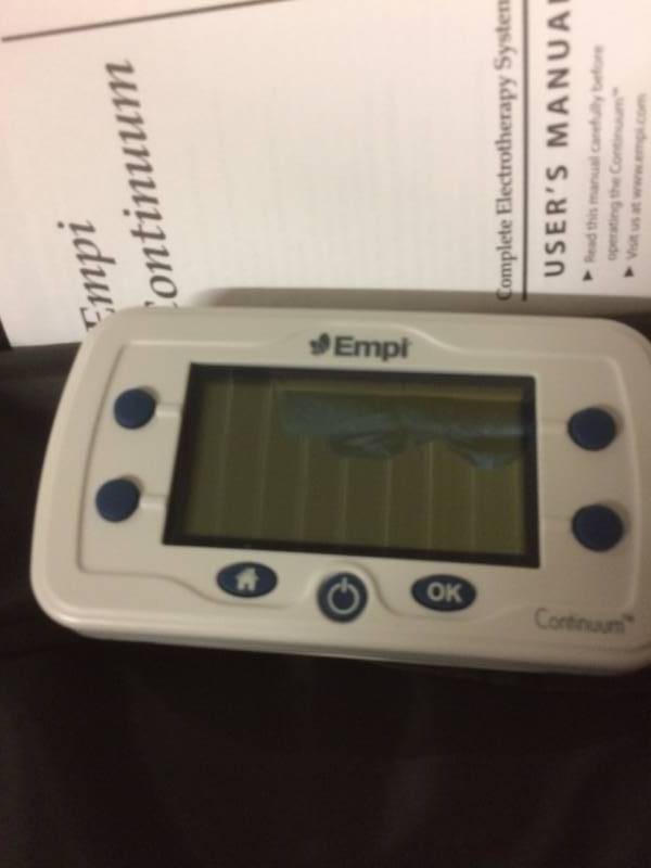 lot 30 image: EMPI CONTINUUM MULTI-FUNCTIONAL ELECTRO THERAPY DEVICE