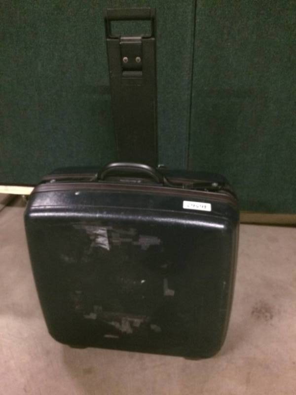lot 9 image: Rolling Foam Padded Safe Transport Luggage