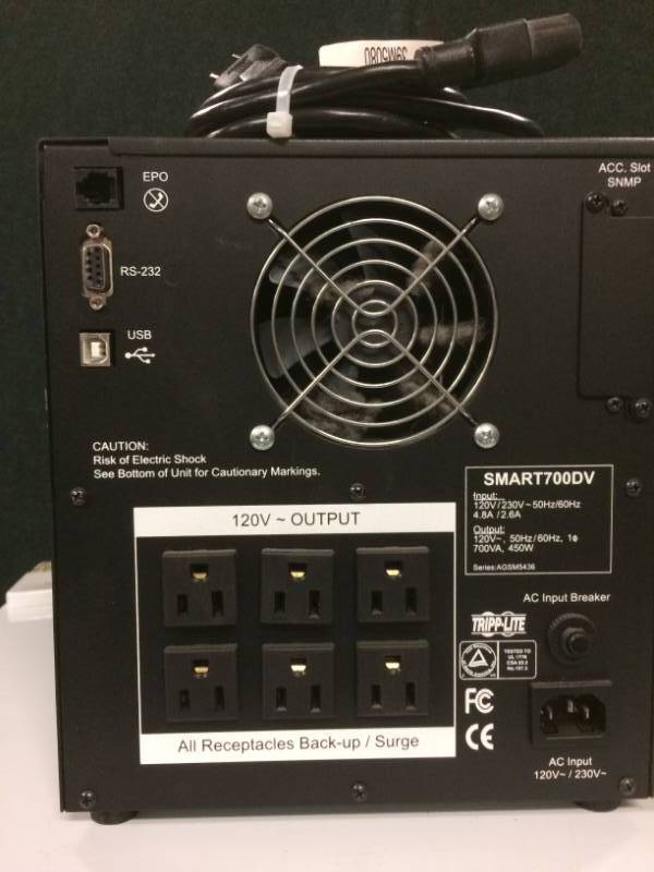 lot 13 image: Tripp Lite SMART700DV 700VA Dual Voltage Tower Line Interactive UPS
