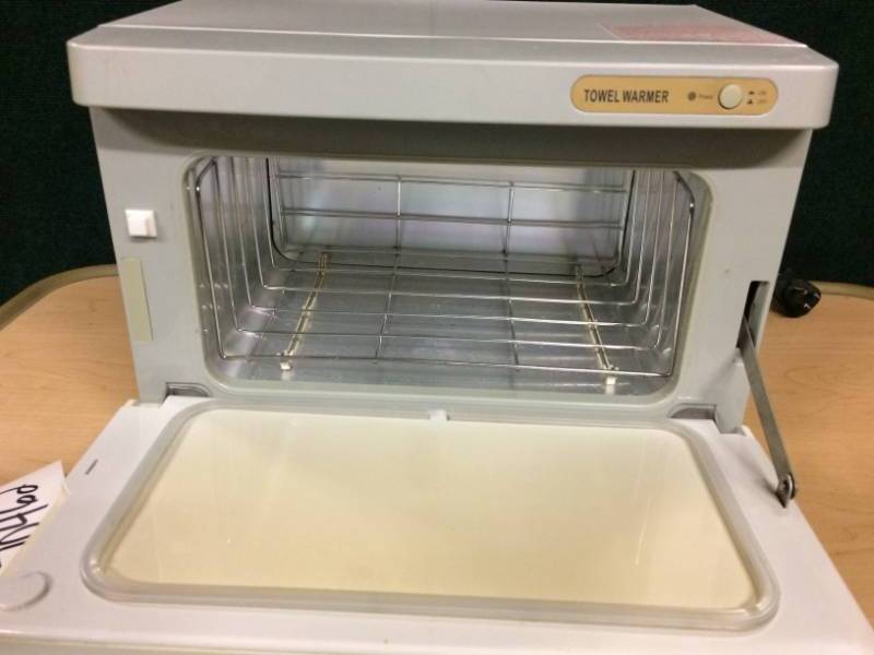 lot 30 image: 12 Piece Hot Towel Cabinet UV Towel Warmer