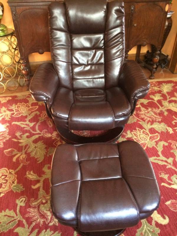 lot 1 image: Gorgeous Belnicks Deep Brown Leather Swivel Recline Chair & Mahogany Wood Base With Matching Ottoman - Excellent Condition
