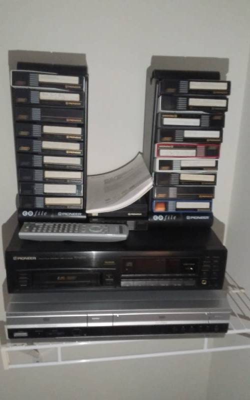 lot 18 image: Sony DVDVHS Combo With Remote, Pioneer 6-Disc CD Changer With Magazines