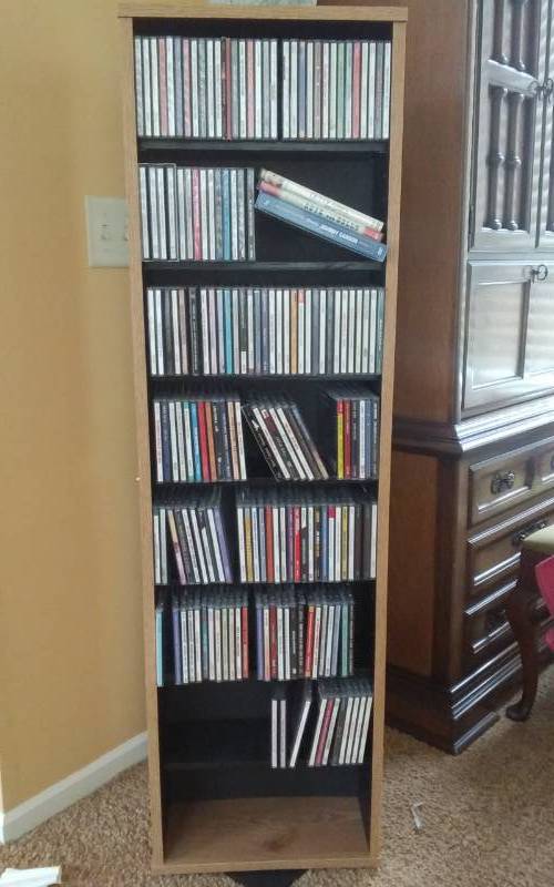 lot 20 image: Large Swivel CD Storage Rack & Approximately 300 CDs All Genres Of Music 12x15x52