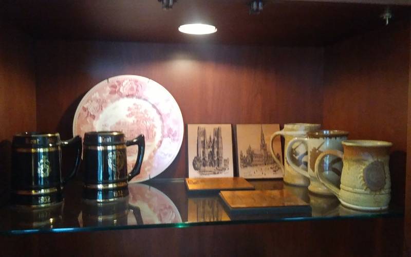 lot 23 image: Contents On Shelf-(Bring Box) Kent State & Pottery Vases, Copper Art