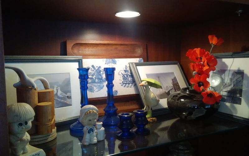 lot 26 image: Contents On Shelf - Blue Glass Candle Sticks, 3-Framed Art, Misc