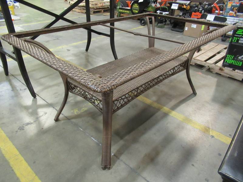 lot 209 image: Metal and Rattan Patio Table, 65 X 40 X 29 Tall. - Missing Glass Top