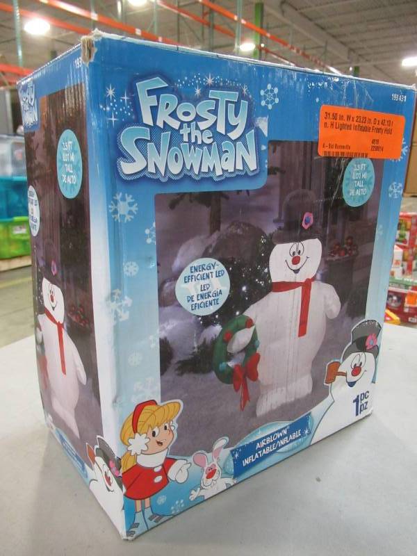 lot 12 image: Home Accents Holiday 31.50 in. W x 23.23 in. D x 42.13 in. H Lighted Inflatable Frosty Holding Wreath