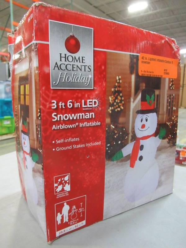 lot 18 image: Home Accents Holiday 42 in. Lighted Inflatable Outdoor Snowman, Model 39417