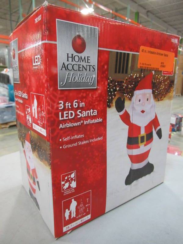 lot 20 image: Home Accents Holiday 42 in. Inflatable Airblown Santa, Model 15289
