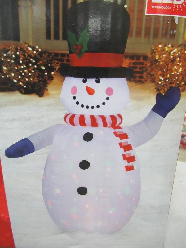 lot 21 image: Home Accents Holiday 6.5 ft. Inflatable Airblown Color Flash Snowman with Red and White Scarf , Model 11993